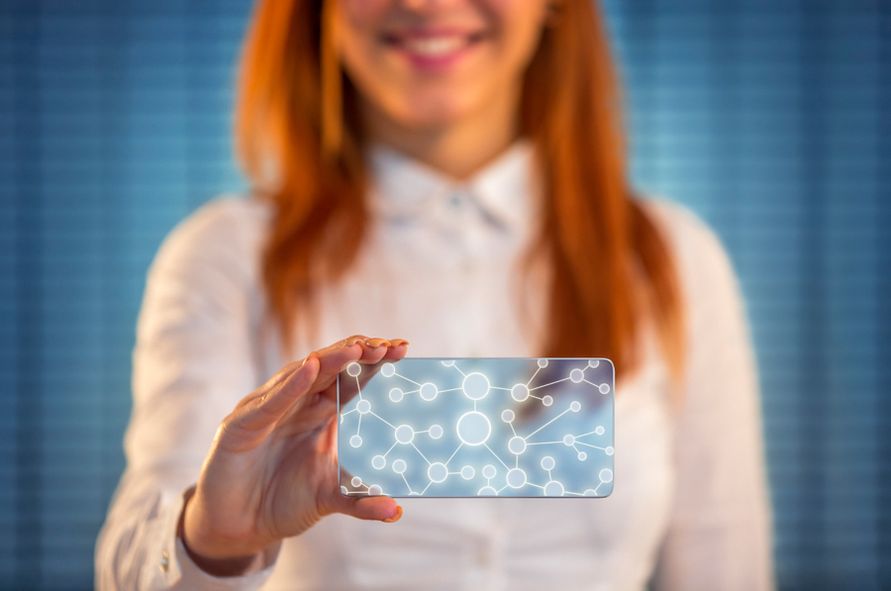 500px Photo ID: 135361499 - Smiling business woman holding screen, social network conception